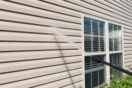 Is pressure washing bad for vinyl siding